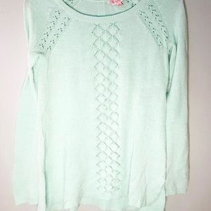 greenish sweater